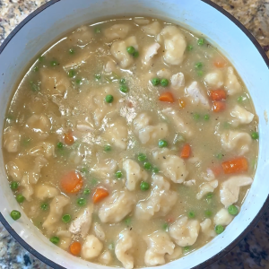 Bowl of chicken and dumpling soup made with Pillsbury buttermilk biscuits