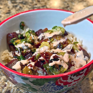 High protein garlic butter Costco steak bite bowls with rice and brussel sprouts