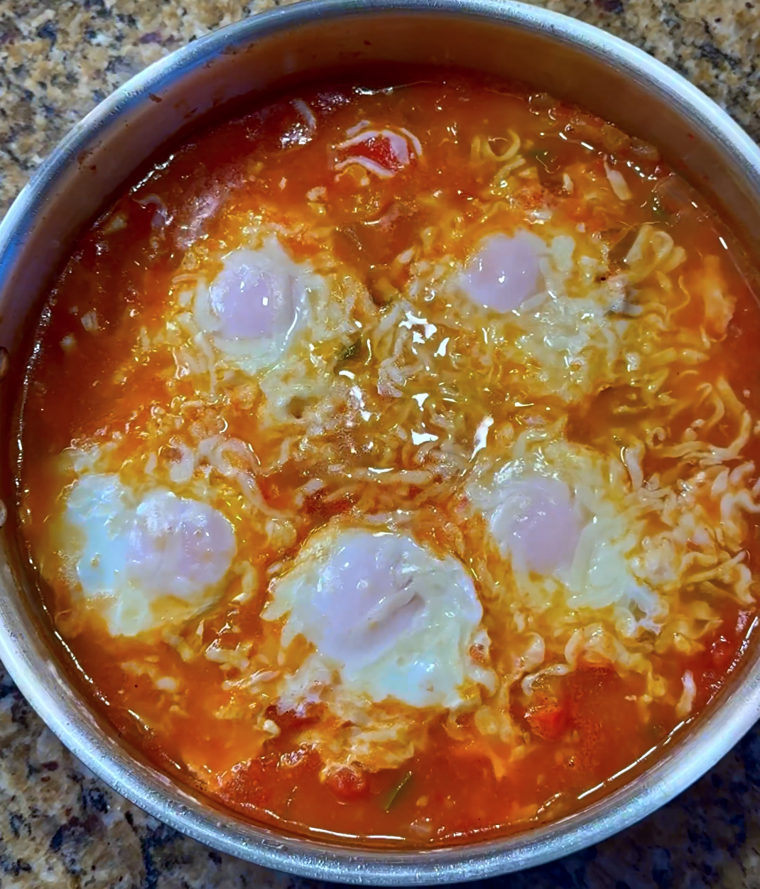 Mediterranean tomato egg skillet with peppers and melted cheese